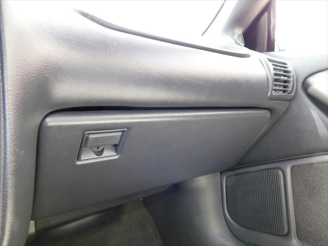 Photo of 1997 White with orange racing stripes Chevrolet Camaro