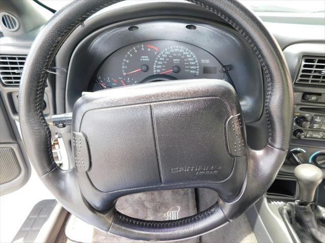 Photo of 1997 White with orange racing stripes Chevrolet Camaro