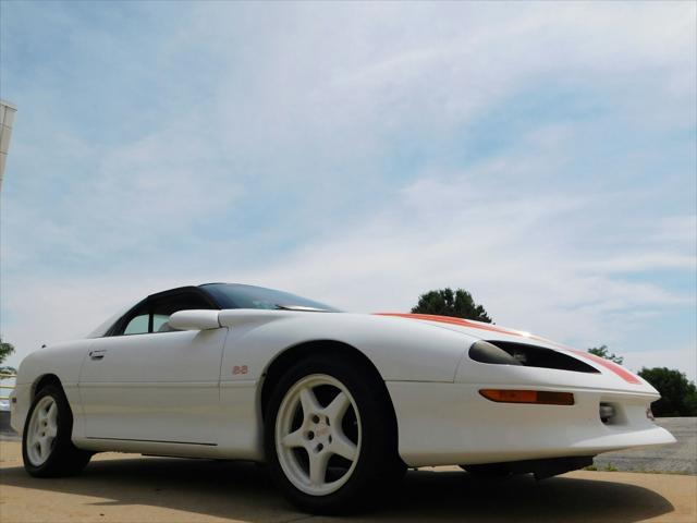 Photo of 1997 White with orange racing stripes Chevrolet Camaro
