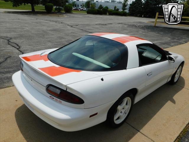 Photo of 1997 White with orange racing stripes Chevrolet Camaro