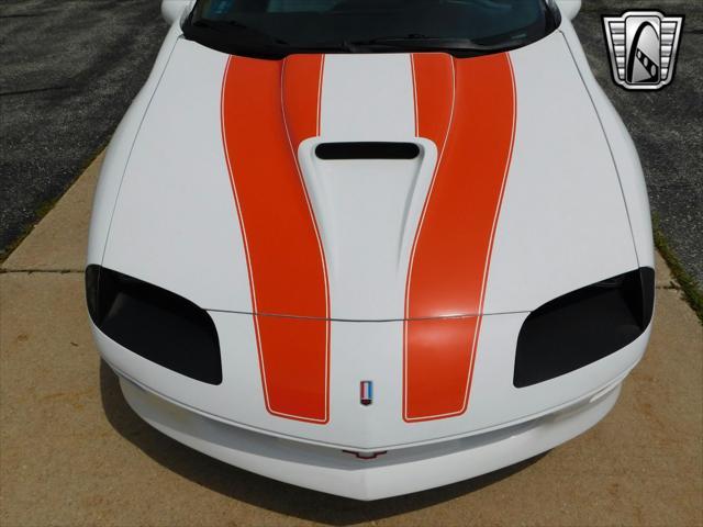 Photo of 1997 White with orange racing stripes Chevrolet Camaro