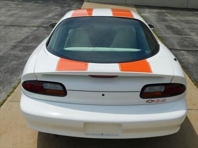Photo of 1997 White with orange racing stripes Chevrolet Camaro