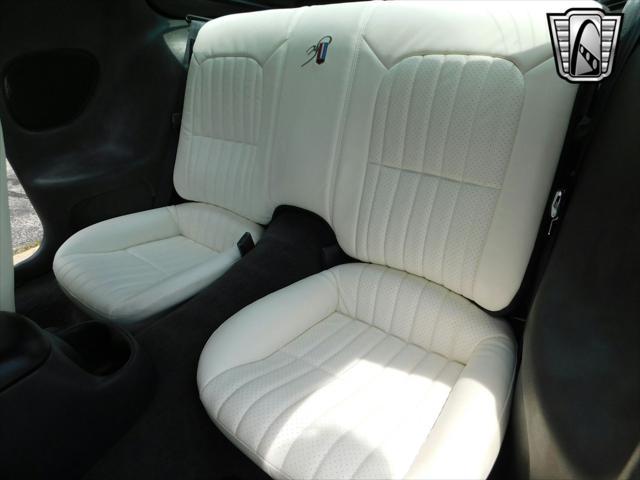 Photo of 1997 White with orange racing stripes Chevrolet Camaro