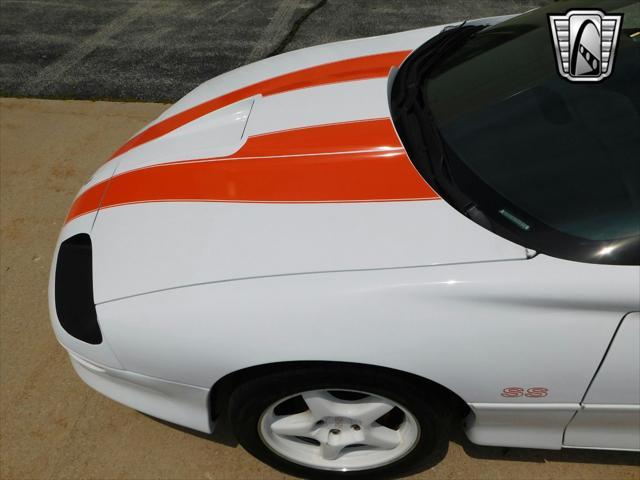 Photo of 1997 White with orange racing stripes Chevrolet Camaro
