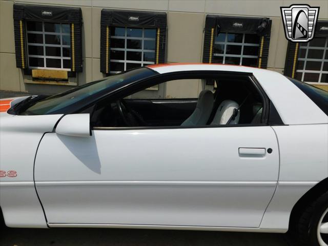 Photo of 1997 White with orange racing stripes Chevrolet Camaro