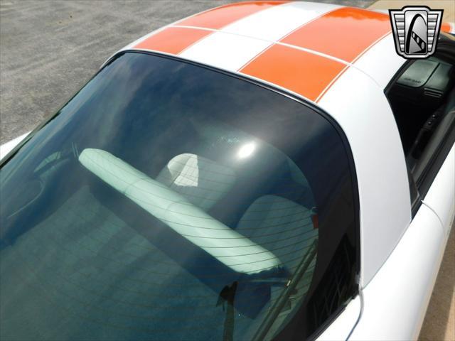 Photo of 1997 White with orange racing stripes Chevrolet Camaro