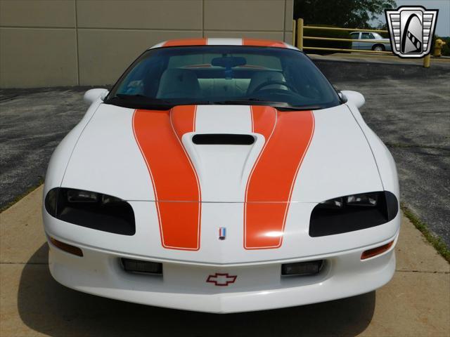 Photo of 1997 White with orange racing stripes Chevrolet Camaro