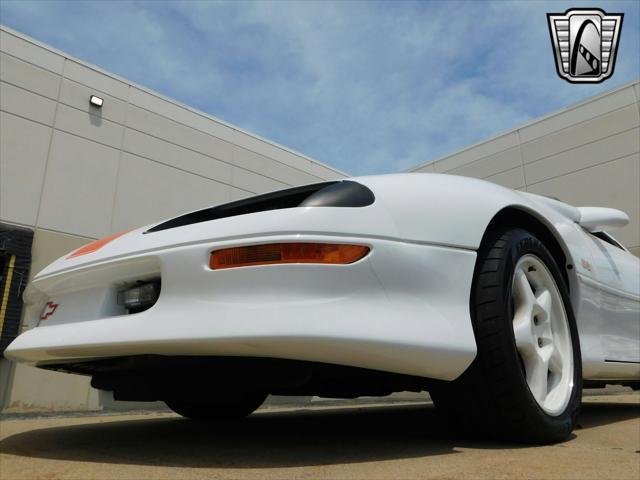 Photo of 1997 White with orange racing stripes Chevrolet Camaro
