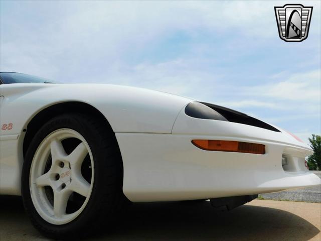 Photo of 1997 White with orange racing stripes Chevrolet Camaro