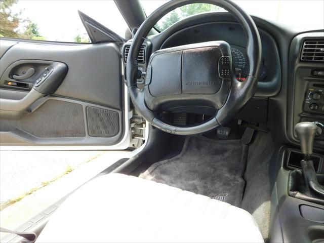 Photo of 1997 White with orange racing stripes Chevrolet Camaro