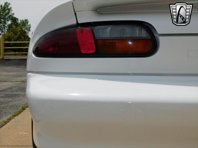 Photo of 1997 White with orange racing stripes Chevrolet Camaro