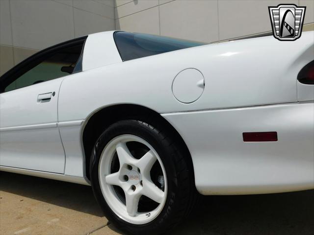 Photo of 1997 White with orange racing stripes Chevrolet Camaro