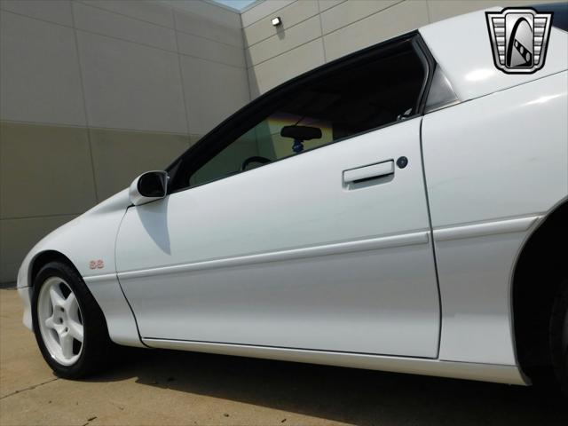 Photo of 1997 White with orange racing stripes Chevrolet Camaro