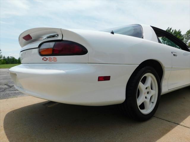 Photo of 1997 White with orange racing stripes Chevrolet Camaro