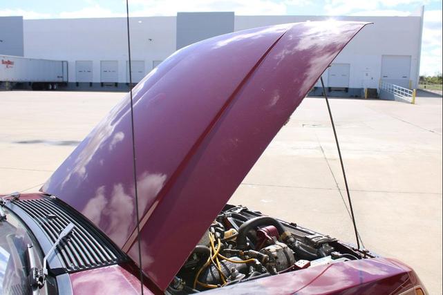 Photo of 1983 Maroon Ford Mustang