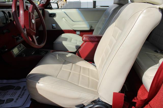 Photo of 1983 Maroon Ford Mustang
