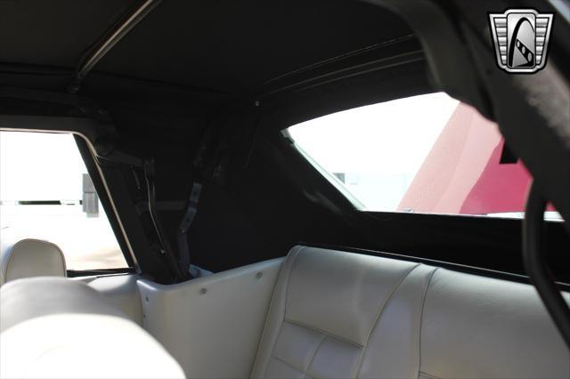 Photo of 1983 Maroon Ford Mustang