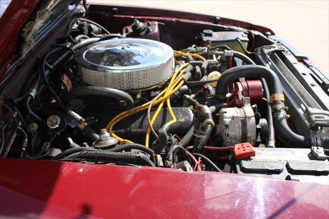 Photo of 1983 Maroon Ford Mustang