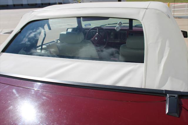 Photo of 1983 Maroon Ford Mustang
