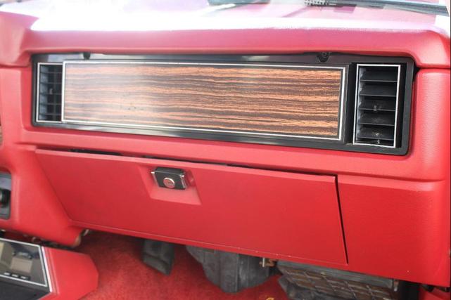 Photo of 1983 Maroon Ford Mustang