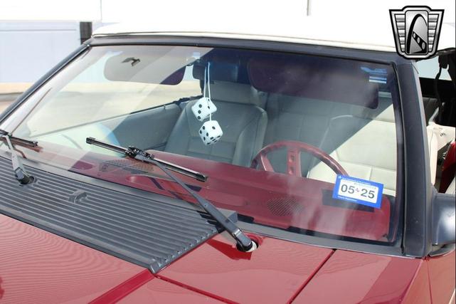 Photo of 1983 Maroon Ford Mustang
