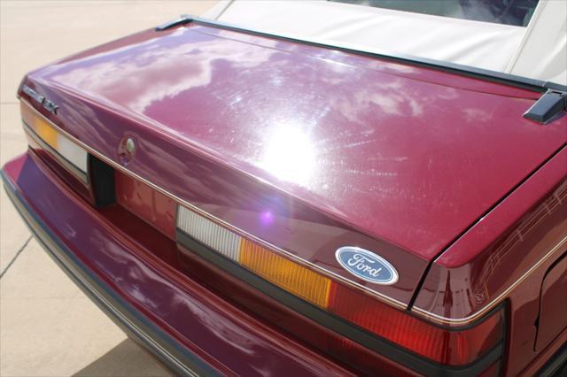 Photo of 1983 Maroon Ford Mustang