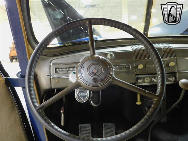 Photo of 1938 Blue Packard 1600