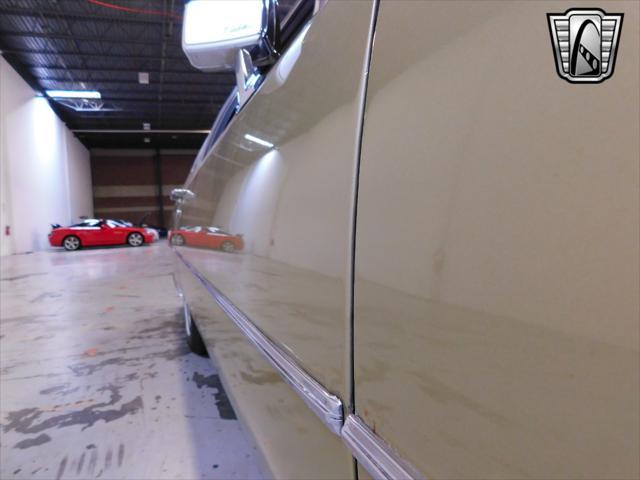 Photo of 1975 Gold Cadillac DeVille