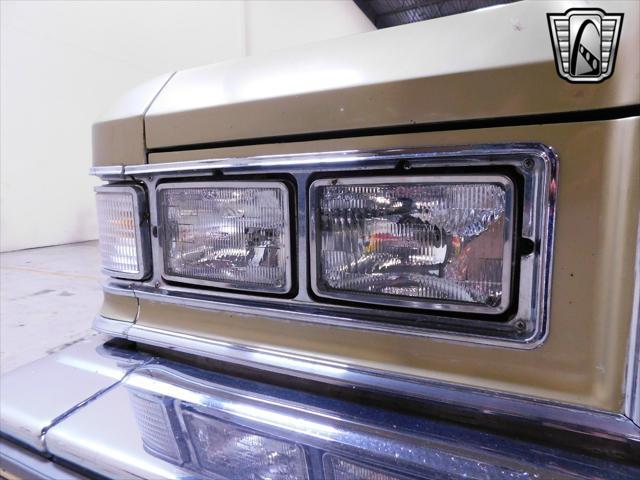 Photo of 1975 Gold Cadillac DeVille