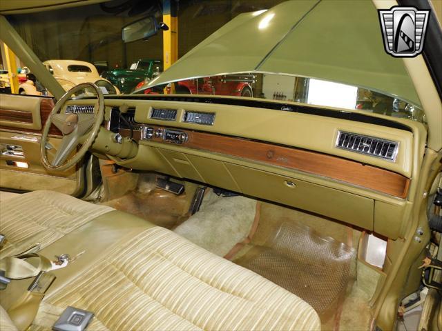 Photo of 1975 Gold Cadillac DeVille