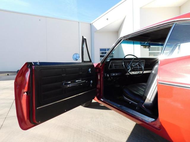 Photo of 1966 Red Chevrolet Impala