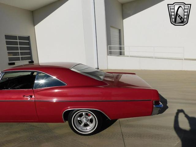 Photo of 1966 Red Chevrolet Impala