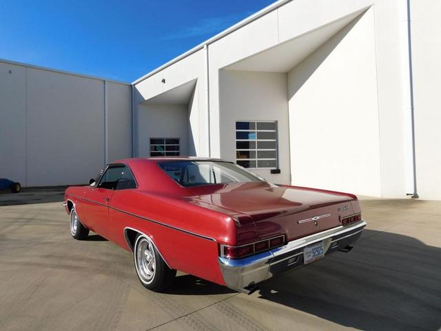 Photo of 1966 Red Chevrolet Impala
