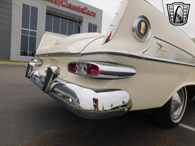Photo of 1959 White Plymouth Sport Fury