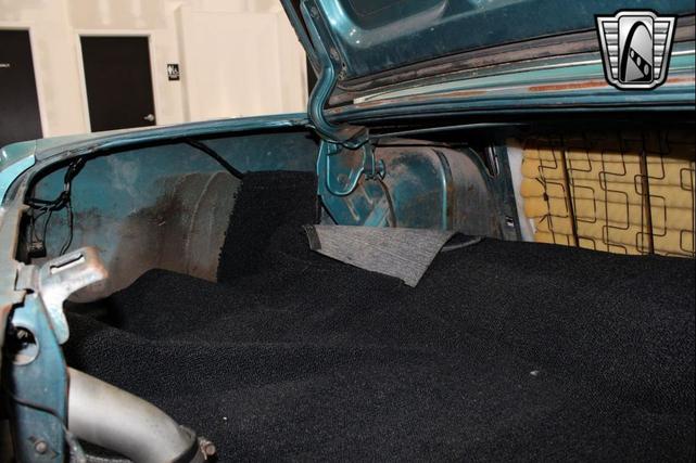 Photo of 1965 Tropical Turquoise Ford Mustang