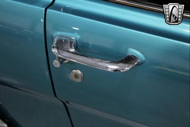 Photo of 1965 Tropical Turquoise Ford Mustang
