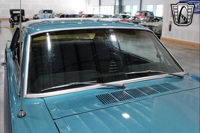 Photo of 1965 Tropical Turquoise Ford Mustang