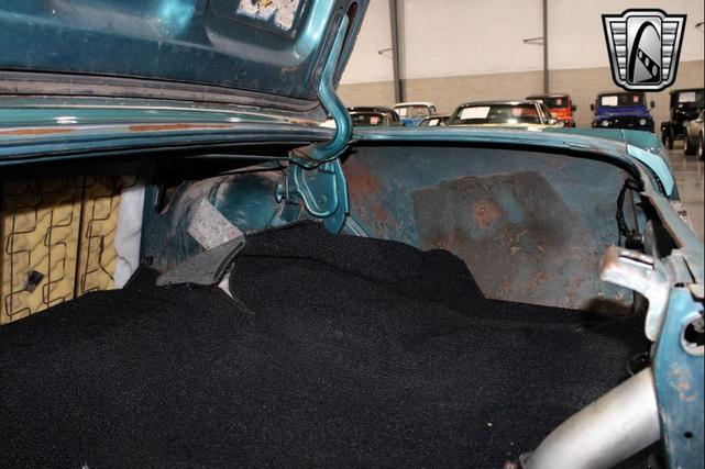 Photo of 1965 Tropical Turquoise Ford Mustang