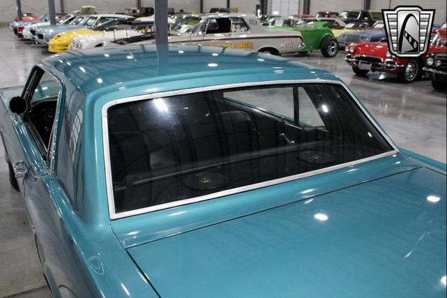 Photo of 1965 Tropical Turquoise Ford Mustang