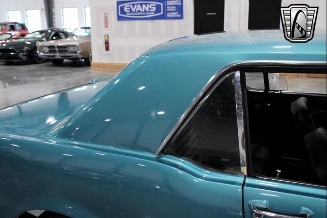 Photo of 1965 Tropical Turquoise Ford Mustang