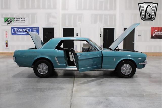 Photo of 1965 Tropical Turquoise Ford Mustang