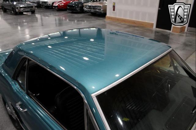 Photo of 1965 Tropical Turquoise Ford Mustang