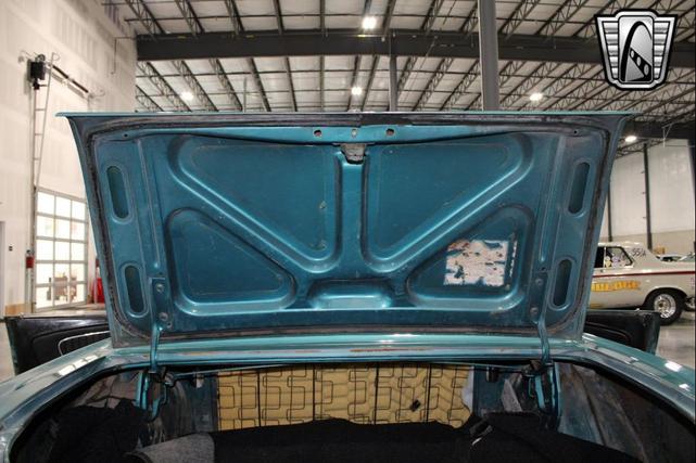 Photo of 1965 Tropical Turquoise Ford Mustang
