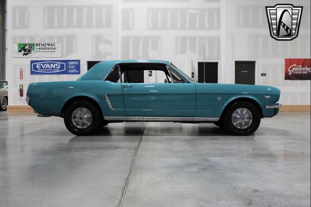 Photo of 1965 Tropical Turquoise Ford Mustang