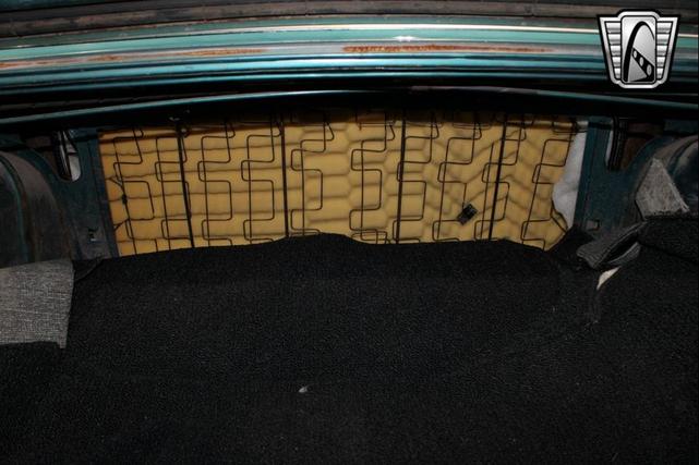 Photo of 1965 Tropical Turquoise Ford Mustang