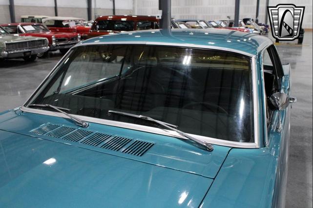 Photo of 1965 Tropical Turquoise Ford Mustang