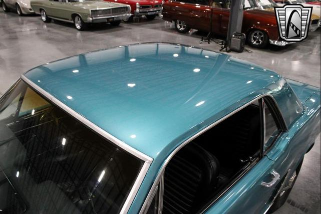 Photo of 1965 Tropical Turquoise Ford Mustang