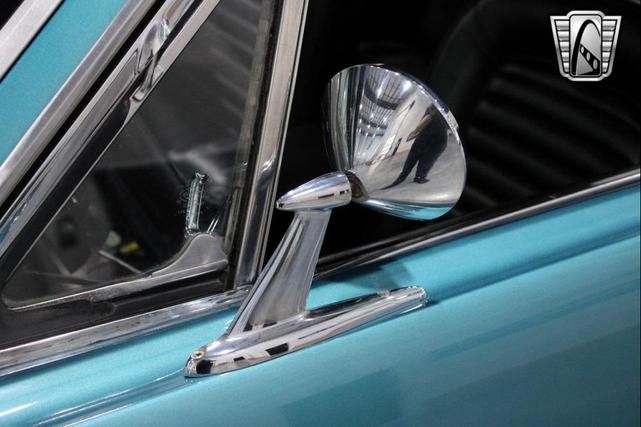 Photo of 1965 Tropical Turquoise Ford Mustang