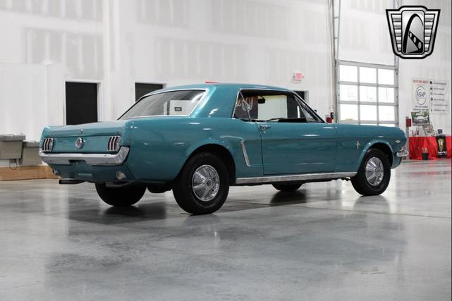 Photo of 1965 Tropical Turquoise Ford Mustang