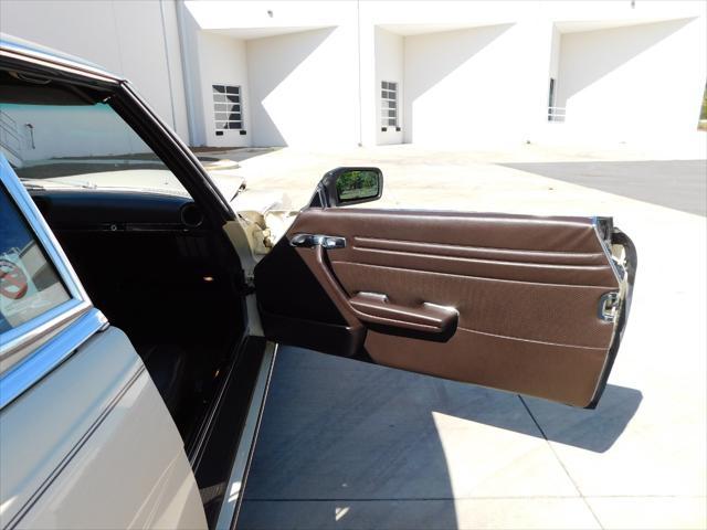 Photo of 1987 Tan Mercedes-Benz 560SL